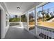 Covered porch with white railings offering neighborhood views and a relaxed outdoor space at 2150 Essex Sw Ave, Atlanta, GA 30311