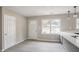 Open-concept living area featuring new flooring and a front entrance at 2945 Catalina Dr, Decatur, GA 30032