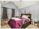 Cozy bedroom features a comfortable bed, natural light, and a tranquil atmosphere, ready for relaxation at 5803 Star Flower Dr, Ellenwood, GA 30294