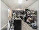 Charming kitchen with a breakfast bar and a view of stainless steel appliances at 5803 Star Flower Dr, Ellenwood, GA 30294