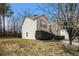 A two-story home with a mix of brick and siding, complemented by fresh landscaping at 5803 Star Flower Dr, Ellenwood, GA 30294