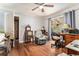 Bedroom with hardwood floors, neutral walls, a ceiling fan, and a window view at 1054 Shepherds Ne Ln, Atlanta, GA 30324