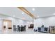Open basement area with neutral walls, and a decorative wood beam along the ceiling at 1300 Village Oaks Ln, Lawrenceville, GA 30043