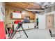 Unfinished workshop in the basement area with shelving and work benches at 1300 Village Oaks Ln, Lawrenceville, GA 30043