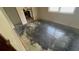 Spacious living room featuring hardwood floors with kitchen access at 2317 Sheryl Dr, Decatur, GA 30032