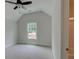 Bright bedroom featuring carpet and a window at 3294 Mill Forest Drive Dr, Conyers, GA 30094