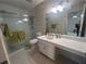 Spacious bathroom with glass enclosed shower and a vanity at 1063 Riverbend Club Se Dr, Atlanta, GA 30339