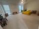 Spacious carpeted bedroom with ceiling fan and natural light at 1063 Riverbend Club Se Dr, Atlanta, GA 30339