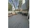 Gray-painted deck with wood railing, perfect for relaxing and outdoor enjoyment at 1063 Riverbend Club Se Dr, Atlanta, GA 30339