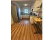 Bright kitchen with stainless steel appliances, white cabinets, and hardwood floors at 1063 Riverbend Club Se Dr, Atlanta, GA 30339