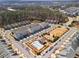 Aerial view showing a residential community with orderly street design, green spaces, and a community pool at 13 Ganel Ln, Alpharetta, GA 30009