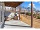 Outdoor back patio with seating area, ideal for relaxing and entertaining guests at 13 Ganel Ln, Alpharetta, GA 30009
