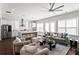 Bright open living space featuring a modern kitchen with stainless steel appliances and comfortable seating at 13 Ganel Ln, Alpharetta, GA 30009