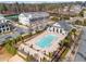 A refreshing pool area with modern poolside building, surrounded by lush landscaping in a community setting at 13 Ganel Ln, Alpharetta, GA 30009