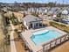 Community pool area with clean blue water, a covered pavilion, and well-maintained landscaping at 13 Ganel Ln, Alpharetta, GA 30009