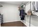 A walk-in closet with built-in shelving and hanging space, providing ample storage at 13 Ganel Ln, Alpharetta, GA 30009