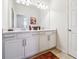Bathroom features a double sink vanity with white cabinets, and tile flooring at 1315 Golden Rock Se Ln # 2, Marietta, GA 30067