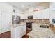 Modern kitchen featuring granite countertops, stainless steel appliances, and ample cabinet space at 1315 Golden Rock Se Ln # 2, Marietta, GA 30067