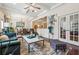 Bright living room seamlessly transitions into dining area, perfect for open living and entertaining at 1315 Golden Rock Se Ln # 2, Marietta, GA 30067