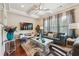 Bright living room with a coffered ceiling, modern furnishings, and large windows at 1315 Golden Rock Se Ln # 2, Marietta, GA 30067