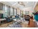 Spacious living room featuring modern decor, a coffered ceiling, and lots of natural light at 1315 Golden Rock Se Ln # 2, Marietta, GA 30067
