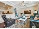 Bright living room with a coffered ceiling, modern furnishings, and seamless flow into the kitchen at 1315 Golden Rock Se Ln # 2, Marietta, GA 30067