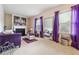 Cozy living room with fireplace, purple couch, and large mirror at 1315 Golden Rock Se Ln # 2, Marietta, GA 30067