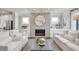 Stylish living room featuring a modern fireplace, minimalist decor, and comfortable white seating at 1745 Lansmere Sw St, Marietta, GA 30008