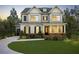 Charming two-story home with well-manicured lawn, dormer window, and brick foundation at 108 Dallas Mark Drive, Canton, GA 30115