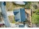 Aerial view of house with dark roof, lawn, driveway, fence, and landscaping at 203 Overlook Ct, Dallas, GA 30157