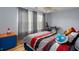 Comfortable bedroom with natural light, ceiling fan, and playful decor, creating a fun and relaxing space at 203 Overlook Ct, Dallas, GA 30157
