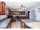 Kitchen featuring stainless steel appliances, a center island, and modern lighting at 203 Overlook Ct, Dallas, GA 30157