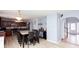 Spacious kitchen with a large eat-in island, access to the living room, and modern decor at 203 Overlook Ct, Dallas, GA 30157