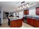 View of kitchen area with stainless steel appliances and dining table at 203 Overlook Ct, Dallas, GA 30157