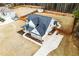 Picture of a home featuring a well-manicured lawn and driveway leading to a fenced backyard at 35 Rock Rose Dr, Covington, GA 30014
