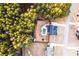 Overhead shot of a property with a private pool, fenced backyard, and beautiful wooded surroundings at 35 Rock Rose Dr, Covington, GA 30014
