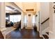 Welcoming entryway with stairs to the right, a view to the living room, and hardwood floors at 35 Rock Rose Dr, Covington, GA 30014