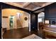 Welcoming foyer with hardwood floors and views to a living room, bathroom and staircase at 35 Rock Rose Dr, Covington, GA 30014