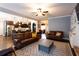 Open-concept living space with seamless flow to the kitchen, dining area, and comfortable seating at 35 Rock Rose Dr, Covington, GA 30014