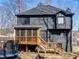 Exterior view of home from backyard, with backyard deck and second story porch visible at 526 Lakeside Dr, Hiram, GA 30141