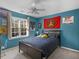 Cozy bedroom with natural light, ceiling fan, and painted with neutral colors at 526 Lakeside Dr, Hiram, GA 30141