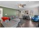 Spacious living room with comfortable seating, fireplace, and large windows offering natural light at 526 Lakeside Dr, Hiram, GA 30141