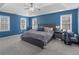 Main bedroom with natural light, ceiling fan, and carpeted floors at 526 Lakeside Dr, Hiram, GA 30141