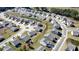 Aerial view showcasing a community of homes with well-maintained landscaping and modern architecture at 60 Cottontail Lane, Villa Rica, GA 30180