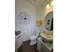 Powder room featuring a vanity with a decorative mirror and elegant wall art at 60 Cottontail Lane, Villa Rica, GA 30180