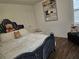 Inviting bedroom featuring a plush bed, artwork, and comfortable decor at 60 Cottontail Lane, Villa Rica, GA 30180