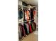 Well-organized walk-in closet with ample shelving and hanging space for clothing and accessories at 60 Cottontail Lane, Villa Rica, GA 30180