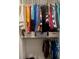 Well-organized closet with clothes on hangers and storage containers at 60 Cottontail Lane, Villa Rica, GA 30180