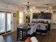 Open-concept living space showcasing the seamless flow between the kitchen and breakfast area at 60 Cottontail Lane, Villa Rica, GA 30180