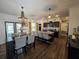 Modern kitchen with sleek countertops, stainless steel appliances, and ample seating at the kitchen island at 60 Cottontail Lane, Villa Rica, GA 30180
